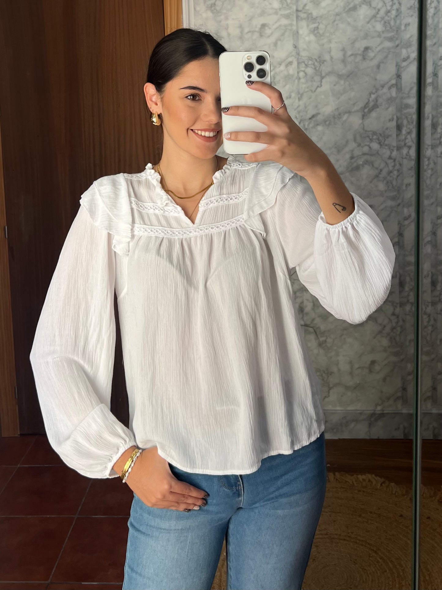 Blusa con volantes tejido glitter