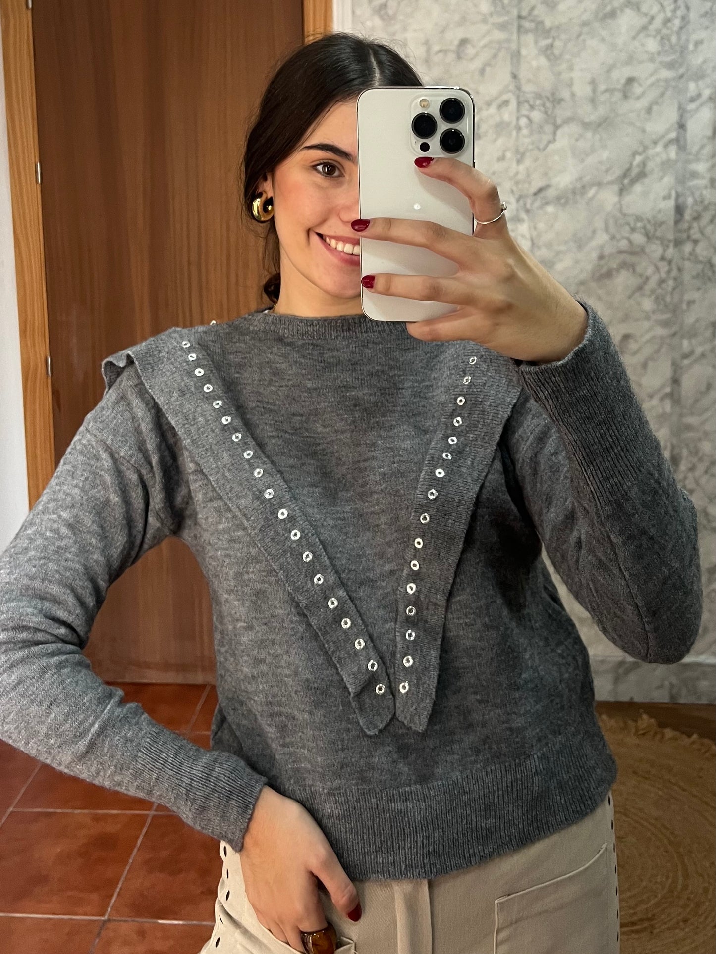 Jersey volante con tachuelas