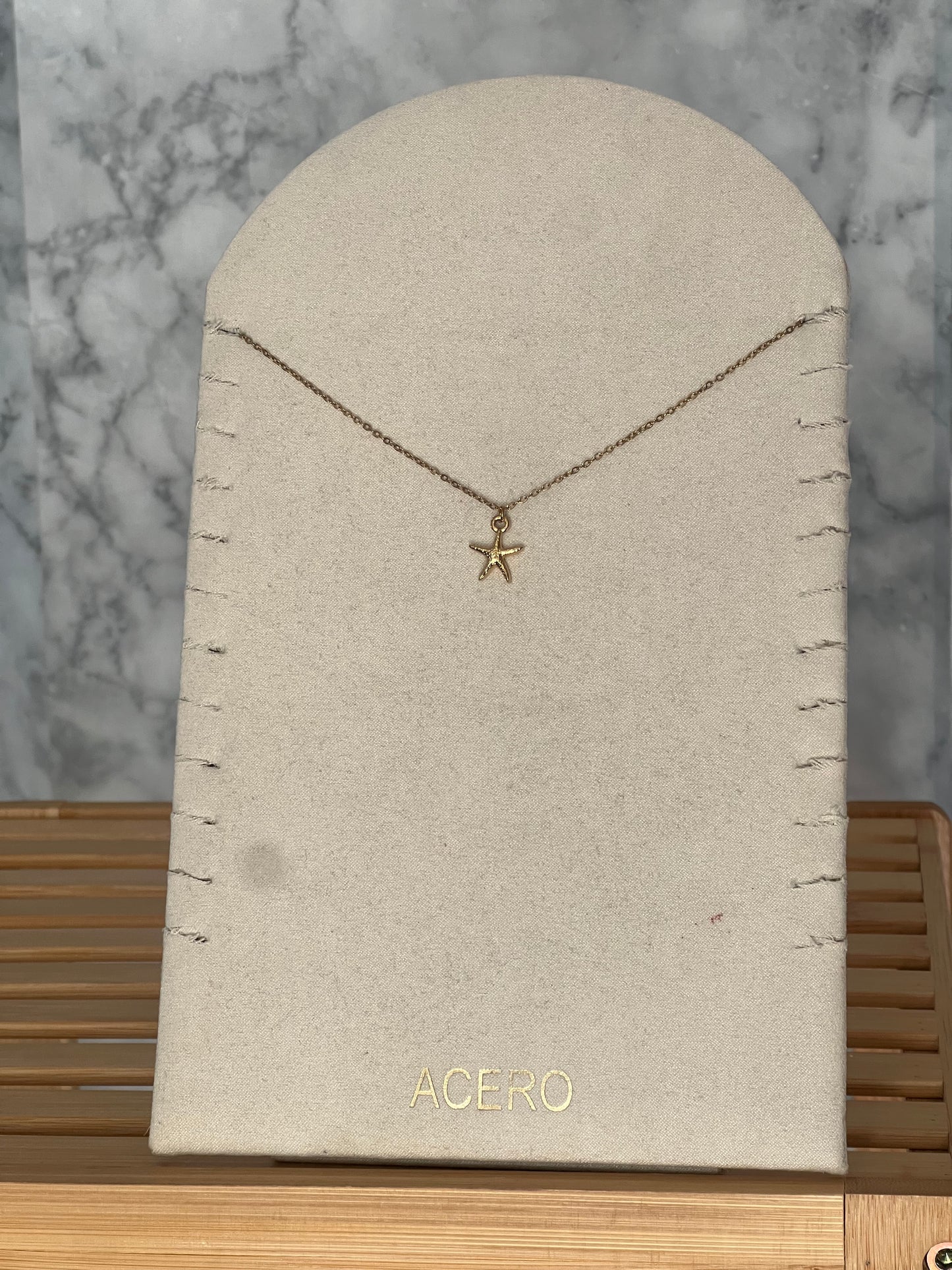 Colgante estrella acero inoxidable