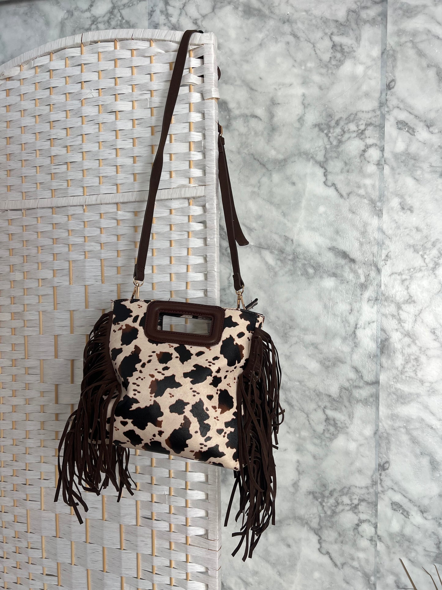 Bolso flecado estampado cow