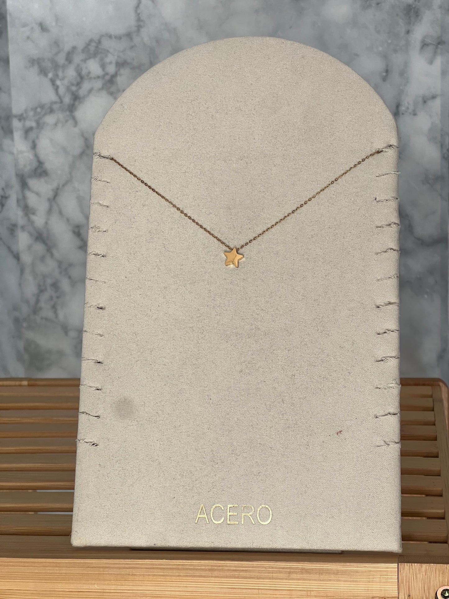 Colgante estrella acero inoxidable